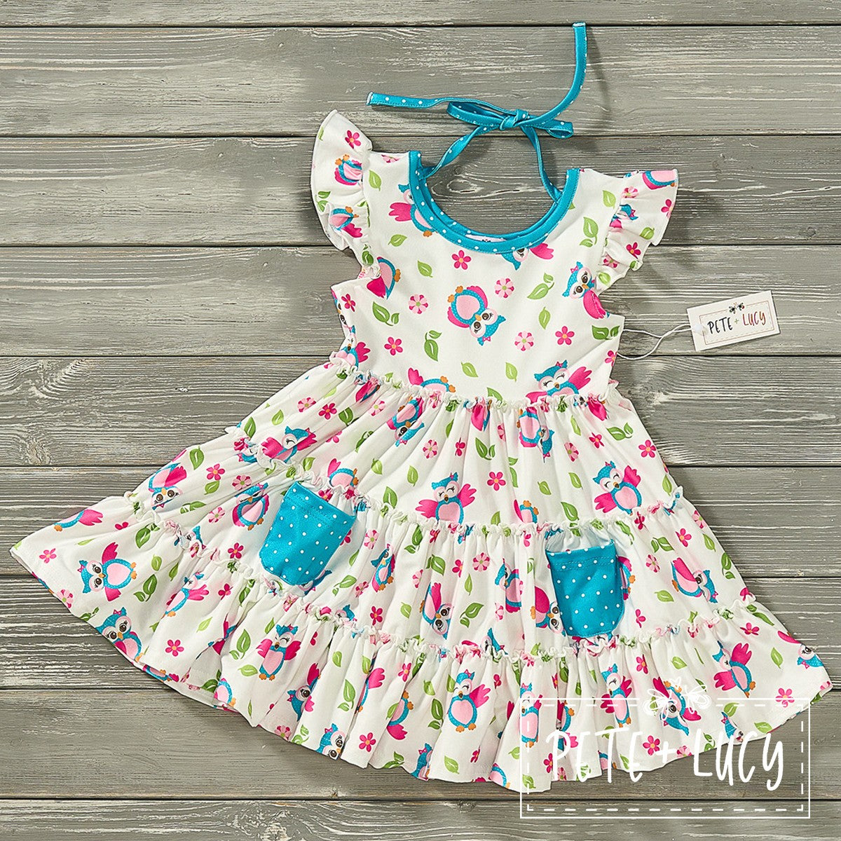 Get ready to be the most stylish and playful owl in the flock with our Happy Owl A-line Flounce Sleeve Dress. Featuring an adorable floral and owl print, this dress also boasts contrasting polka dot fabric on the front pockets and neckline for an extra touch of fun. And let's not forget the beautiful triple ruffle tier design for a flirty and feminine look. You'll be sure to turn heads and hoot with joy in this dress!