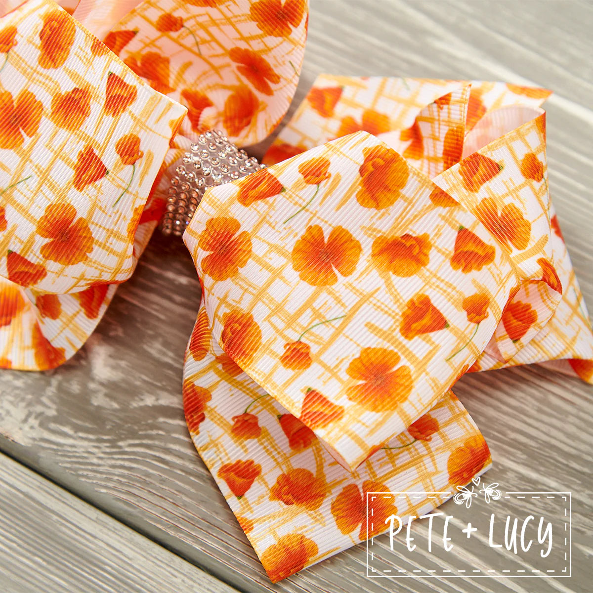 Add a sparkle to your special occasion with these deluxe rhinestone clip bows! With an array of patterns to choose from, these oversized bows make any outfit dazzle! Match them with our outfits, purses sibling sets, and doll dresses for that "icing on the cake" look.