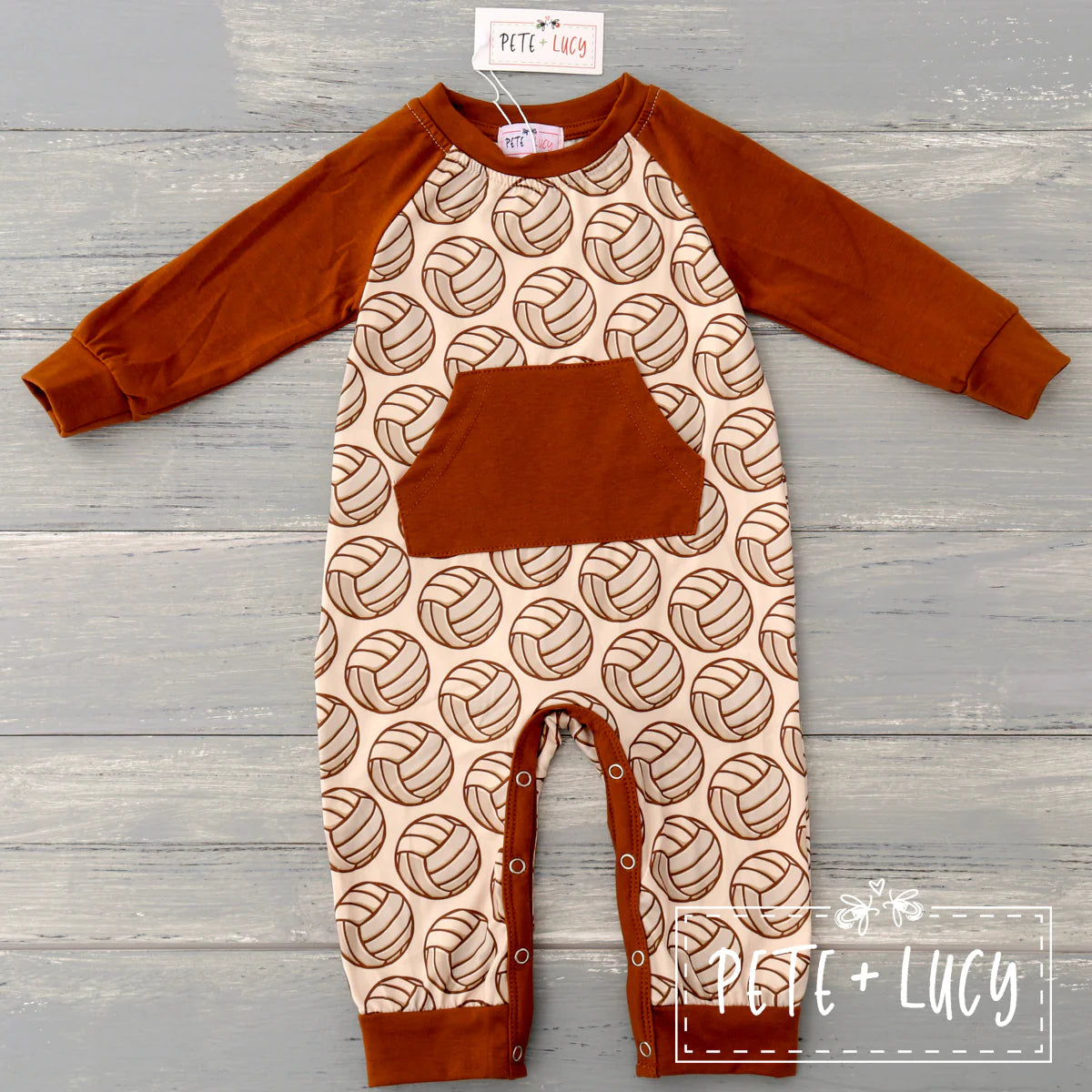 This Vintage Sports Boys Infant Romper is perfect for active little ones. Crafted with a vintage sports print, solid-color sleeve, and rounded neckline, this romper is sure to keep your child fashion-forward and comfortable. Plus, the easy snap crotch makes it a breeze to change.