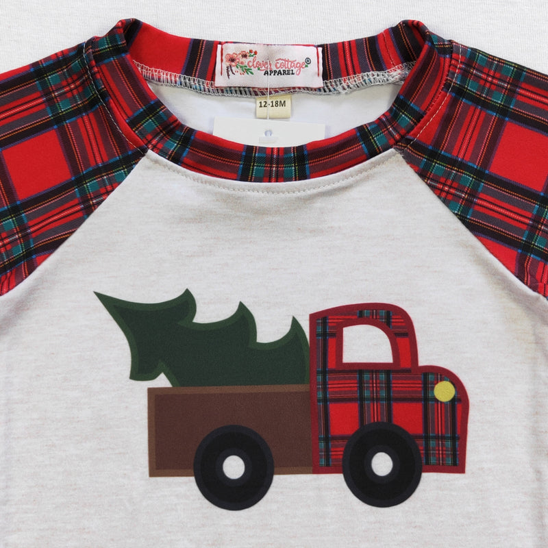 Cozy up this holiday season in this adorable raglan shirt that captures the holiday spirit! This raglan shirt features festive plaid on the sleeve and neck and an incredibly cute pickup truck hauling a Christmas tree! Perfect for slipping into holiday cheer! 🎄