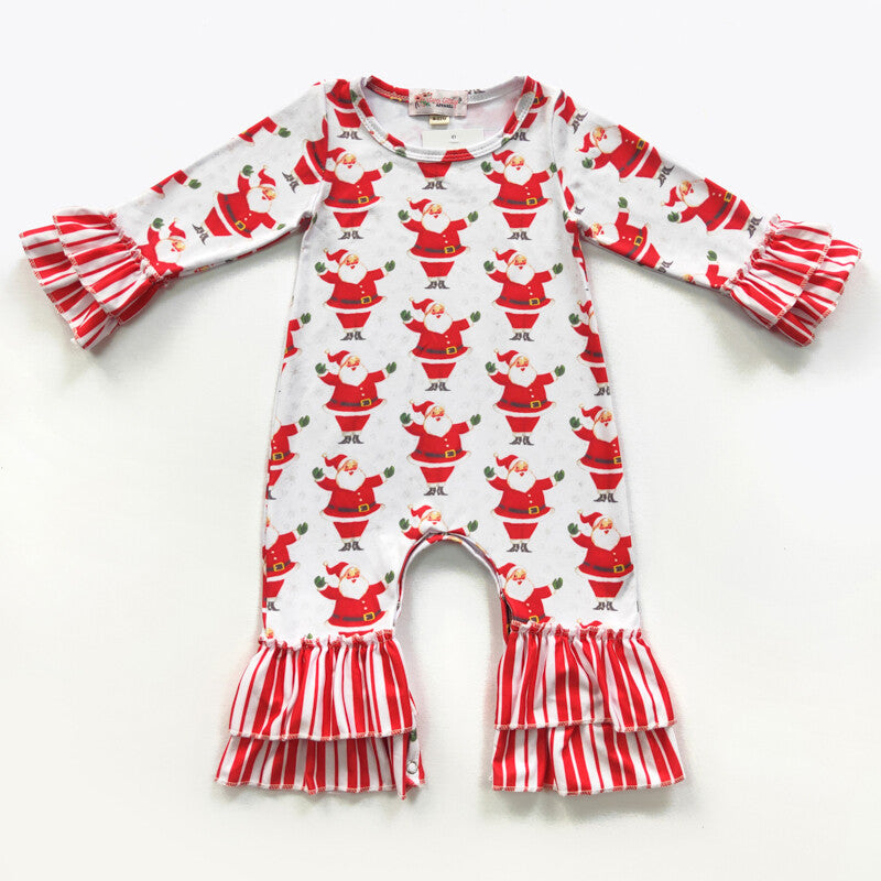 This festive Candy Cane Santa Girls Romper is what holiday dreams are made of! She'll love the sweet combo of Santa and candy cane prints, plus an irresistible double ruffle at her wrists and ankles. The perfect pick for the most adorable holiday boutique outfit! 🎅