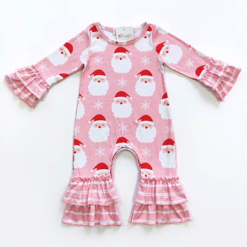 This Pink St. Nick Girls Romper is an adorable boutique holiday look! It features a multi pattern design on a pink background, with a sweet double ruffle at the wrist and ankle. Dress her up with the cutest Christmas style and she'll be ready for the big day! 🎅