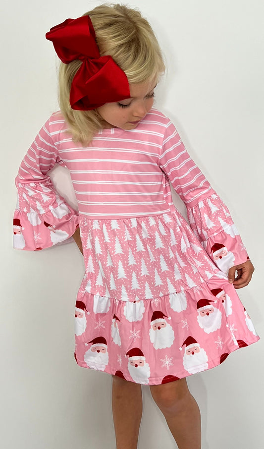 This Pink Bell Sleeve St. Nick Dress is the cutest way to make a festive statement! With a super cute multi-fabric print featuring stripes, trees, and good old St. Nick himself, you can wear it as a dress or pair it with leggings for two different holiday looks!😍🎄