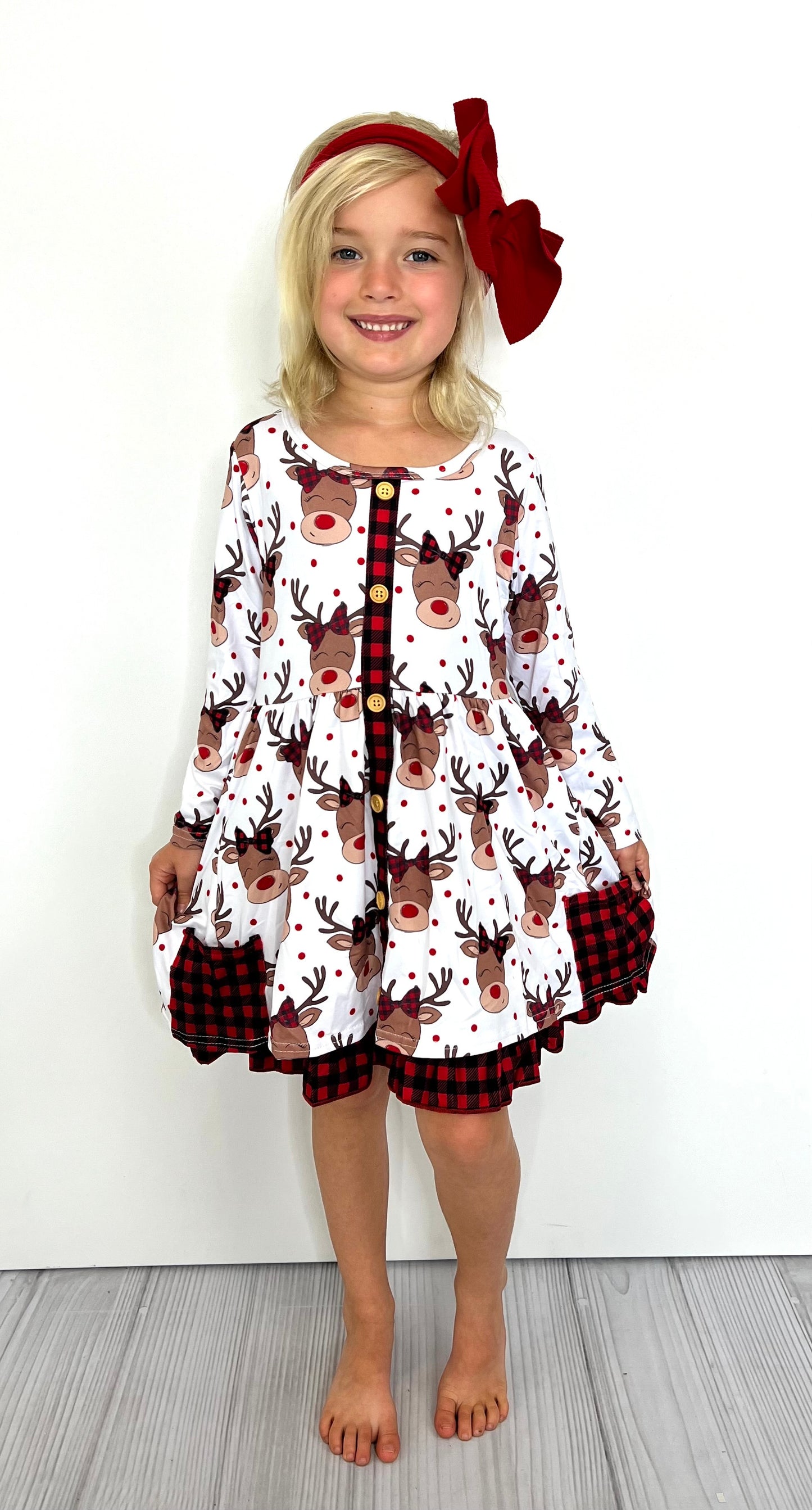 Tis the season! Get your holiday on with the Miss Blitzen dress, featuring a playful reindeer print, plus buffalo plaid pockets and a classic button-down look. Crafted from super soft milk silk fabric, this dress is perfect for twirling and jingling all the way! Pairs great with other sibling sets for a spot-on family look. Ho ho ho!