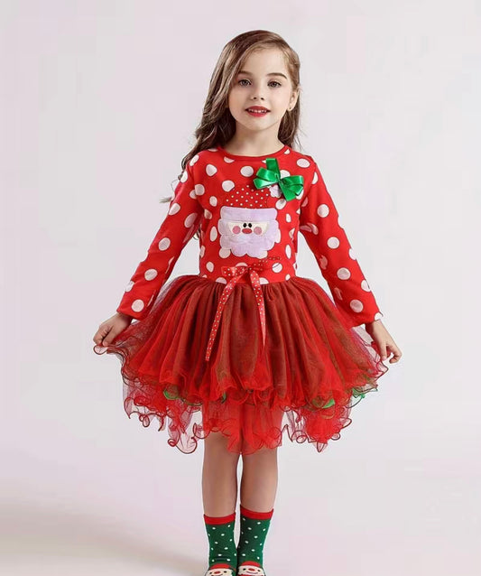 Make the holiday season extra special with this dress so cute it's practically Santa Clause-dorable! Make a merry statement with the fun red & white polka dot top with Santa appliqué, and multi tulle red and green skirt. An absolute holiday must-have!