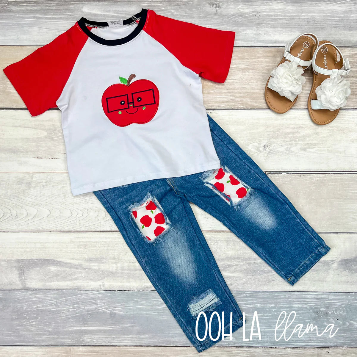 This Happy Apple Denim Pant Set has it all for your little one on their first day of school! Patched jeans with smiling apple patches , and short sleeve shirt, with smiling apple applique. Let their excitement show, send them off in style! They are sure to be the apple of your eye.