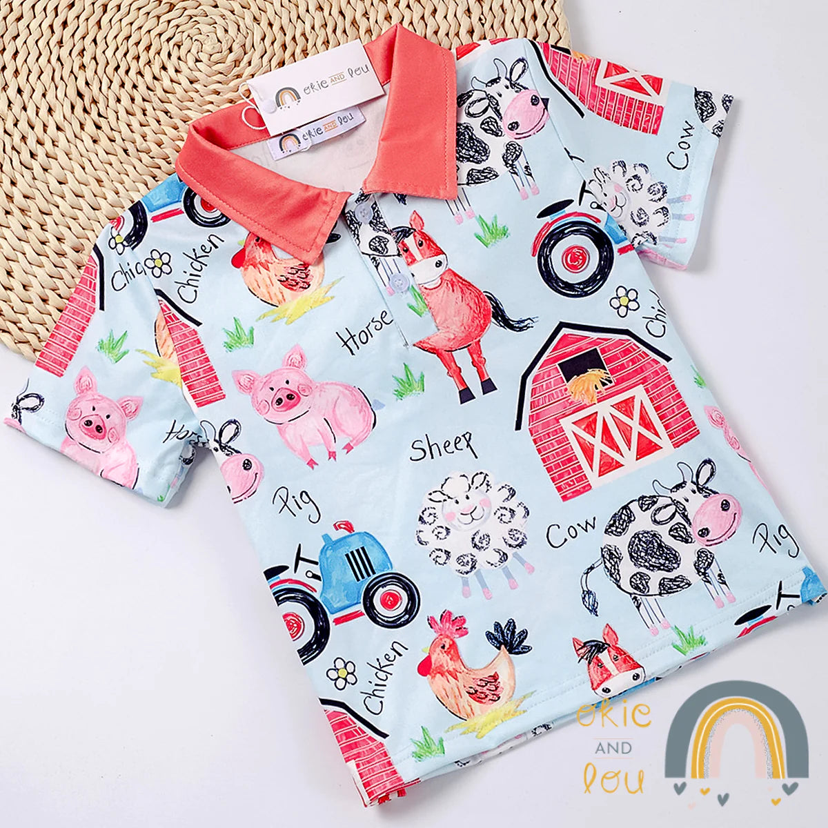 This Farm Life Boys short sleeve shirt is a great way to let your little one make a big statement! Featuring an adorably printed fabric with a farmyard-ful of critters and a barn, this collared top is an ideal way for your mini-farmer to show off their style! Super soft milk-silk fabric. Check out our additional sibling outfits in the Farm Life series.