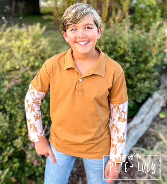 Bring out your inner wild side with this Dearly-Deer Boy's Long Sleeve Shirt! Its straight collar polo and deer print contrasting sleeve make it the perfect combination of style and comfort. Crafted from a cotton blend, it's super soft, cozy, and perfect for any occasion. Dress it down with jeans or up with khakis or dress pants - the subtle neutral brown and beige tones make it a fashion chameleon. So take the plunge into your wild side with  Dearly-Deer!