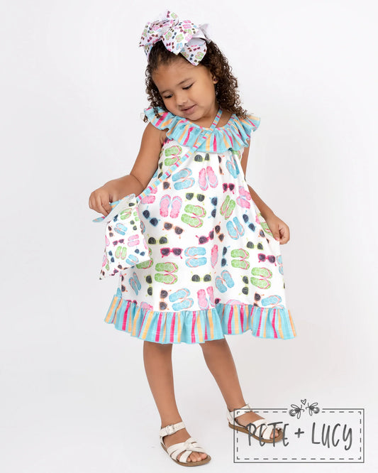 Treat your little diva to this fun and flirty Flip-Flop Summer Sleeveless Dress! Crafted from smooth and breathable Milk Silk, it features a halter neckline, ruffle accent, and a truly groovy trapeze cut. For an extra 'pow' of style, it's finished with a fab ruffle hem. Put a major 'yay' into your summer wardrobe!