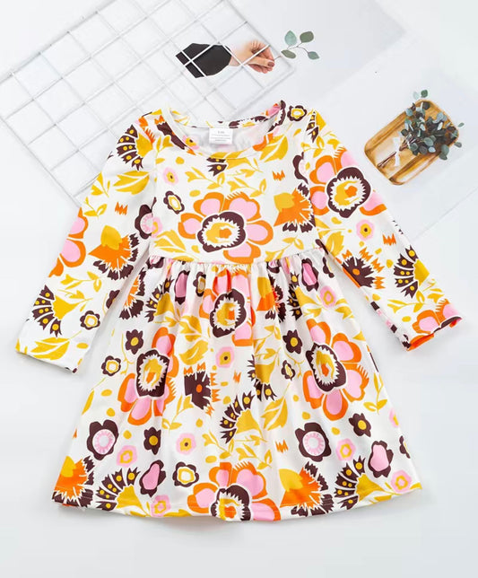 Fall-ing For You Long Sleeve Dress is here to make sure you stand out! Its stunning floral print in warm fall colors is sure to capture attention, while the jewel neckline and buttery soft milk-silk fabric make for a comfortable, stylish look. Dare to dazzle and embrace your autumnal style!