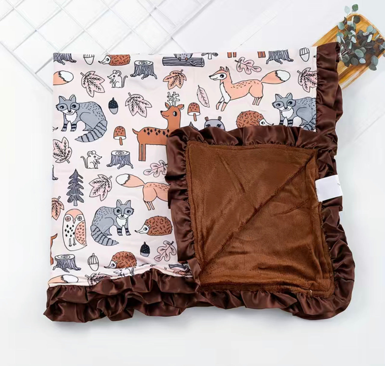Snuggle up with our Minky Blankets! Ultra-soft and oh-so-adorable, these luxe blankets have two sizes (30x37 non ruffle and 32x32 with ruffle) and a ton of charming designs to choose from. Plus, they're made of milk silk fabric, so they'll definitely keep your little one warm and cozy. Just one snuggle and you'll be hooked! 