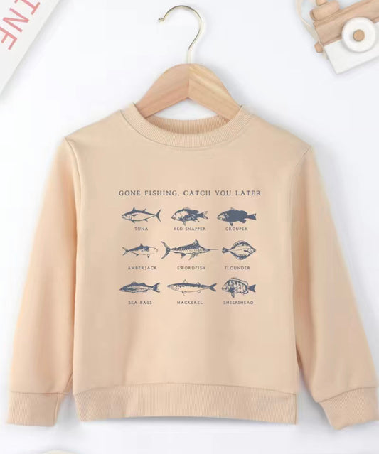 Go ahead, cast your net - this lightweight sweatshirt has you covered! Featuring a fun multi-fish graphic with 'Gone Fishing - Catch You Later' to show your true laid-back, sea-loving spirit 🐟. Put it on and enjoy your next nautical adventure! Available in beige and sky blue