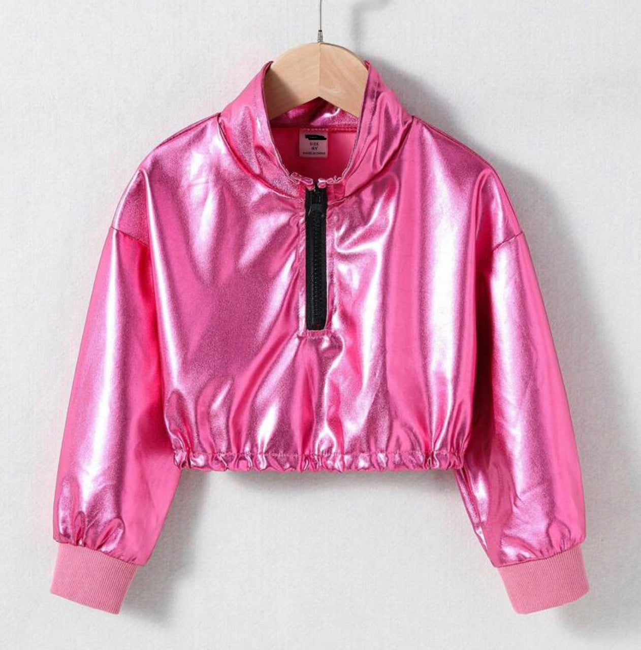 If you're looking to amp up your wardrobe, this Pink Passion Metallic Long Sleeve Crop Top is perfect for adding a hint of glamour. Love the style of the half zipper front and elastic fit crop bottom. The metallic fabric will make you stand out, and BARBIE will be jealous!