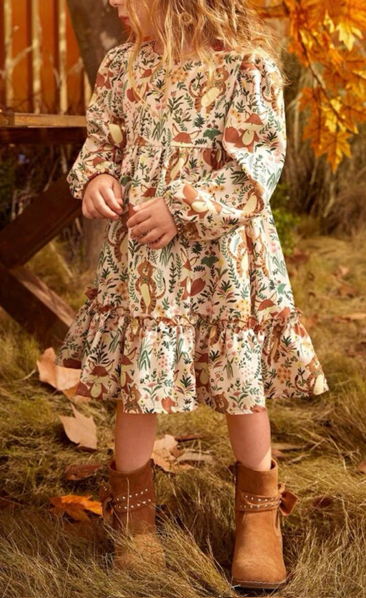 Fashion AND nature come together in this fun Friends of the Forest Long Sleeve Dress. Featuring a flattering flounce sleeve and ruffle hem, your wild side will be unleashed and ready to take on anything. Plus, the adorable animal and forest type print definitely takes the cuteness up a notch! Who says you can't look stylish and save the planet? Your wardrobe will thank you.