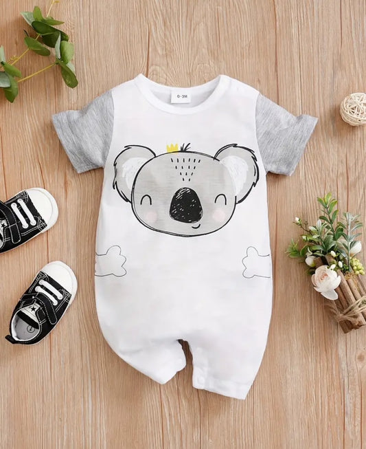 Fall in love with this cozy romper that combines style and comfort with an adorable koala graphic. The snap closure and rounded neck make dressing easy. Perfect for cuddles and playtime, this romper is a must-have for your little one! (No koalas were harmed in the making of this product!)🩶🐨