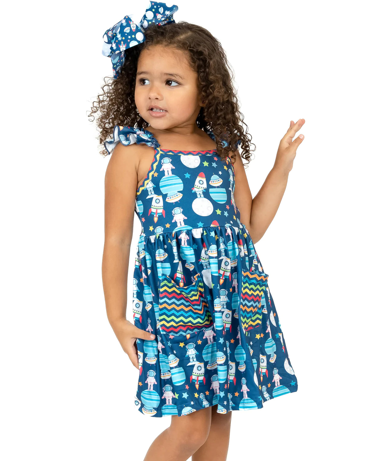 This Aliens and Friends dress is out of this world! Its adorable outer space-inspired print and multi-color zig zag pockets make it totally unique, while the jewel neckline, flutter strap sleeves, and A-line cut show off your style. Get ready to blast off in this stylish dress!