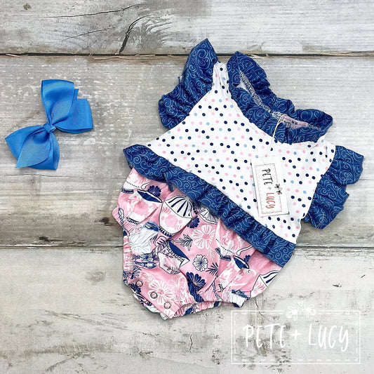 Send your little girl back in time with this Vintage Tea Girl's Bubble Romper! With its classic-style (polka dot, swirl and vintage tea pattern designs) as well as delightful ruffles all around, she'll feel like a true vintage tea party princess! Plus, with an adorable sibling set available, there'll be no rivalry between siblings over who looks cuter. Time for tea!