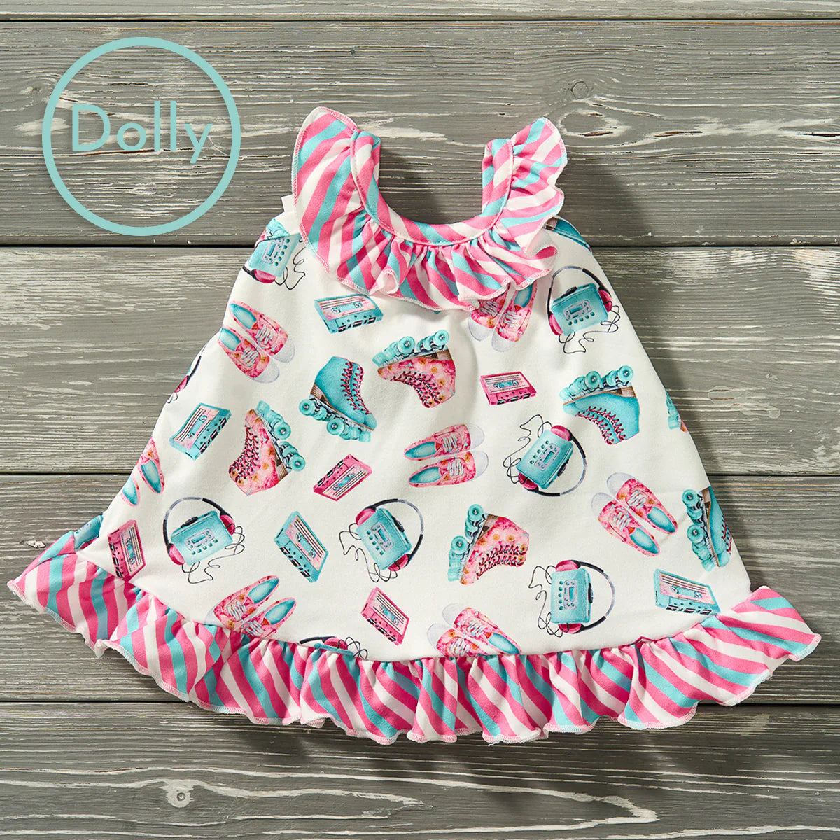 This Skater Girl Dolly Dress is perfect for your little one to match their dolly. The adorable roller skate and stripe print make it a great addition to any doll’s wardrobe. It’s designed to fit a standard 18" doll like American Girl.