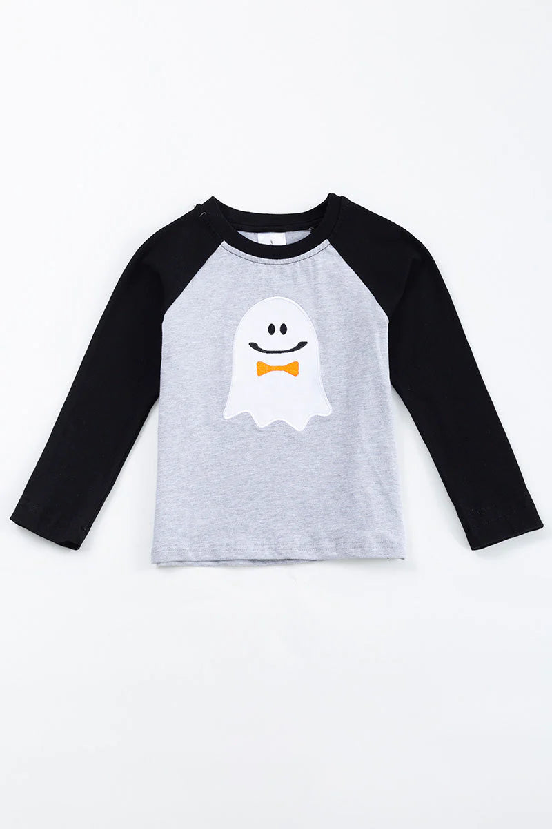 The Happy Ghost Raglan Shirt is perfect for Halloween. It has a soft grey background with ghost applique featuring an orange bowtie 🎃 for a cute look. The black raglan sleeves are ideal for a comfortable fit. Don't miss out on this spooky style!