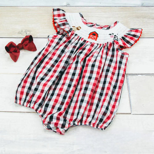 Look like the happiest little farmer in town wearing this "Welcome to the farm girl's bubble romper"! With a classic, red white and navy blue print, plus bric-a-brac trimmed flutter sleeve and farm-life embroidered smocking around the neck, it's as cute as a basketful of kittens! So get ready: hayrides await!