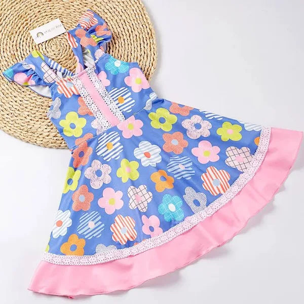 Be a burst of color in this sweet and colorful floral flounce shoulder dress. With a beautiful large floral print and bright colors, you'll love the unique patterns. The ruffle detailing adds a touch of beauty and playfulness to this dress. Time to embrace your fun and flirty side!