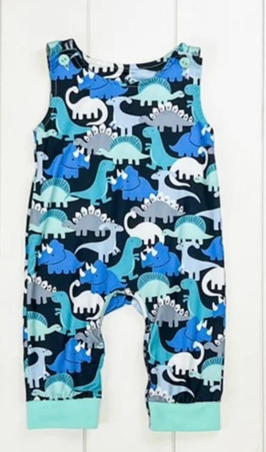 Welcome your little one to the world of dino friends with this adorbs romper in blues and greens! The milk silk fabric is oh so soft, and Its snap legs and adjustable buttons at shoulder make for easy access-hassle free changing. Give your mini-me a cozy, stylish start with this dino friends romper! ROAR!