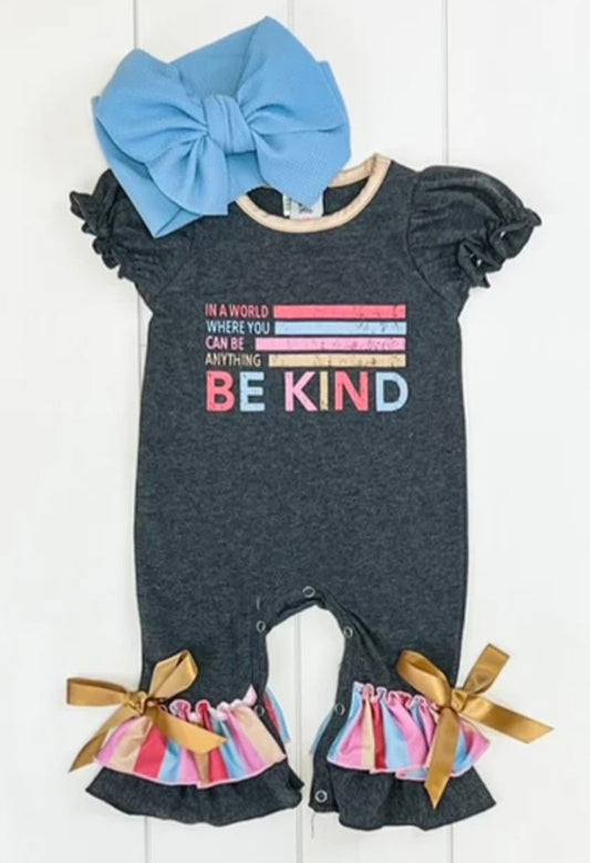 Gussy up your sweetheart with this "Be Kind" Girls Infant Romper! It's the perfect blend of stylish and comfortable - with a dark gray color, with the words "In a world where you can be anything, Be Kind" printed on the chest, and pretty colorful stripes and ruffles on the hem. We love the ruffled-cap sleeve and easy open snap legs, but the gold satin bows at the ankles are the icing on the cake! Let your little one make kindness fashionable!