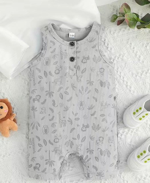 Step into summer in style with our Grey on Grey Tropical Print Shortie Romper! Featuring a fun and playful tropical print in shades of grey, this romper is sure to have your little one ready to hit the beach (or the jungle gym). With its sleeveless design, round neck, button front, and snap crotch, this romper is as comfy as it is stylish!