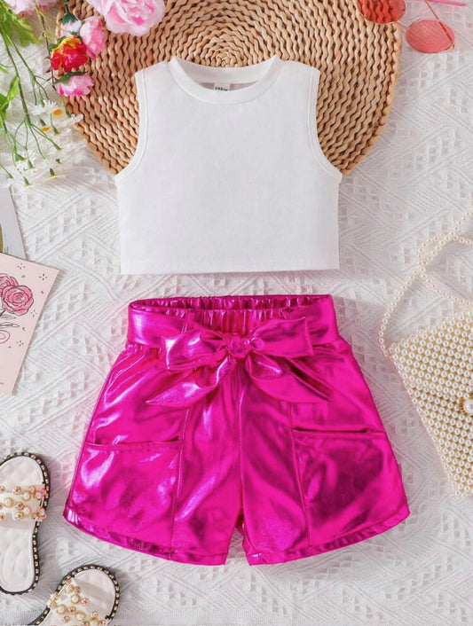 Unlock your inner Barbie in this awe-inspiring 2-piece set. Show off your style with the white tank crop top and sparkling hot pink metallic shorts, complete with two conveniently placed pockets and a matching belt. Whether you’re looking to make a statement or just add to your wardrobe, this short set is a must-have!