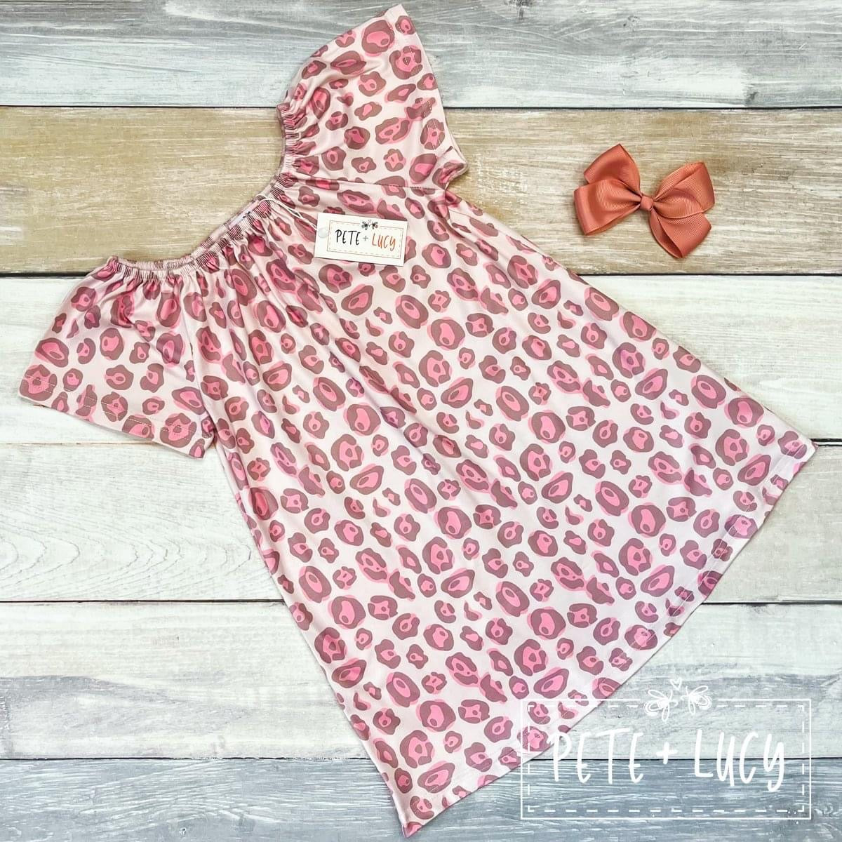 This sweet and wild leopard print dress could be worn on it's own, or paired with leggings or stockings for multiple adorable looks!