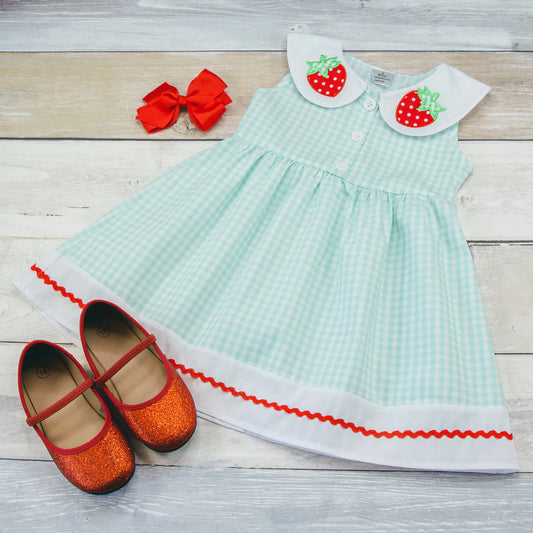 Strawberries are a seasonal must, and this adorable seersucker dress with rick rack trim and berries on the collar could not be cuter!! The perfect addition to your little sweetie's wardrobe!