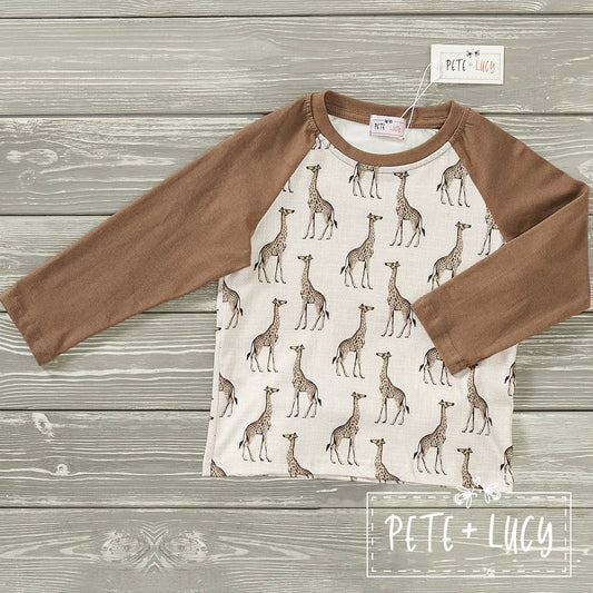 This Tall as a Giraffe Long Sleeve Shirt is crafted with exceptional detail. Featuring a stylish giraffe pattern against a solid color sleeve and round neck, this design ensures a comfortable fit and optimal breath-ability. Achieve a chic, stylish look paired with any casual outfit!