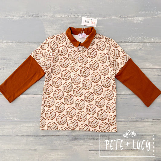 This Vintage Sports Boys long sleeve shirt is the perfect blend of fun and practicality. Showcasing a vintage sports print and contrasting solid fabric sleeve and collar, this shirt is sure to turn heads. Completed with a straight collar, it ensures a comfortable fit and a timeless look.