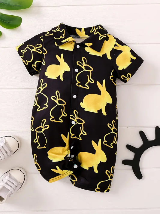 How adorable your little one will be in this black short romper with golden bunny print. Super cute with tailored collar, short sleeve and snap front and crotch. 