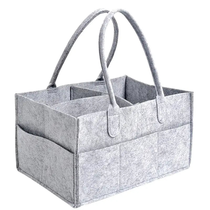 Go beyond the basics with this modern take on diaper organization! Our Felt Diaper Caddy is crafted with high-quality felt for superior durability, plus 8 outer pockets for maximum storage and customizable inserts for flexible organization. Handcut edges keep the caddy neat and in place, so you can diaper in style!