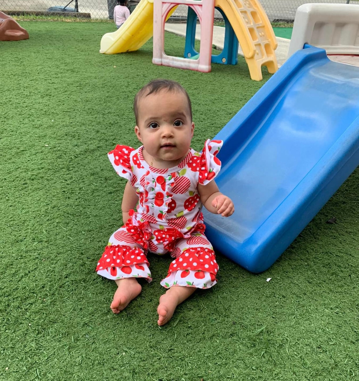 This adorable Polka dot and apple print romper is perfect for the apple of your eye!! We love the style of the romper with the pockets and all of the ruffles. Loving this adorable outfit!!