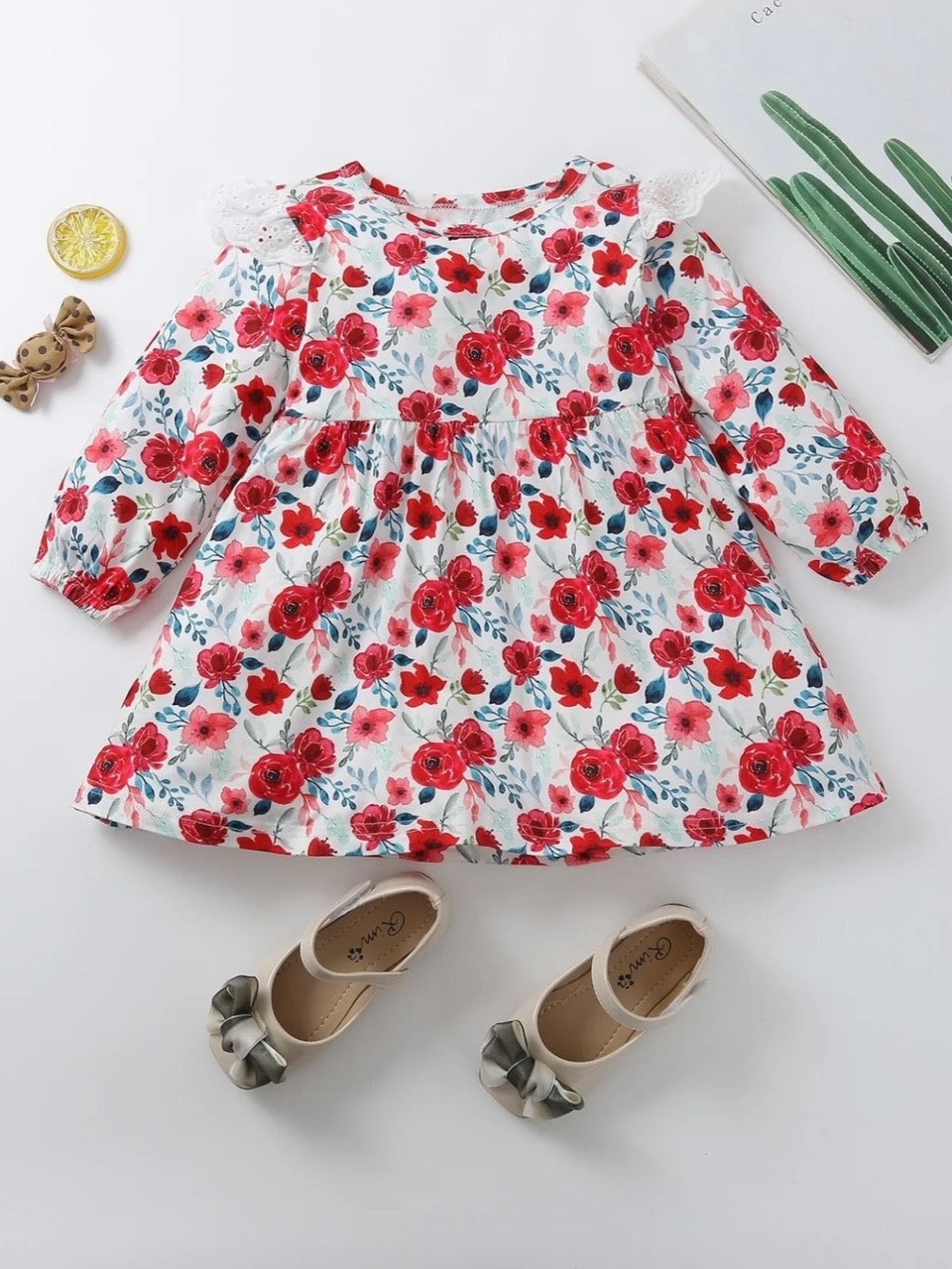 Roses are red-this dress cant be beat, you will want your precious little girl to have this in their wardrobe to look so pretty and sweet!! Loving this long sleeve A-line dress with lace accent on the shoulders. So Pretty!!